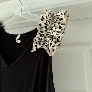 Ruffle sleeveless little black dress